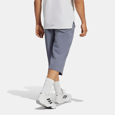 اديداس بنطال التمرين ترين إسينشالز بطول 3/4 للرجال أسود