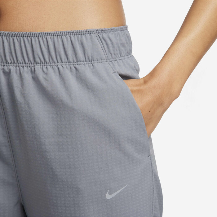 نايكي دراي-فت فاست بنطال الجري ميد-رايز 7/8 وورم-اب للنساء رمادي image number 3